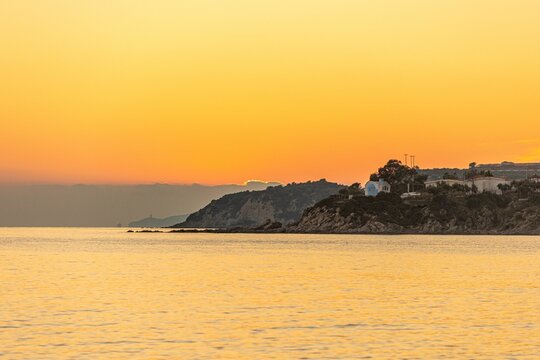Scenic view of sunset over Ammolofoi Beach, Kavala in Greece