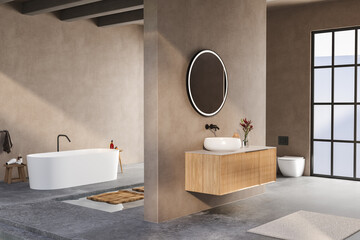 A bathroom with a white bathtub and a sink with a mirror above it