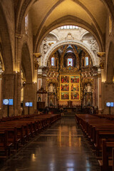 Fototapeta premium Interior of the Valencia Cathedral. Inside the Gothic Cathedral in Valencia, Spain is also known as St Mary's Cathedral, a Roman Catholic church in Plaza de la Reina.