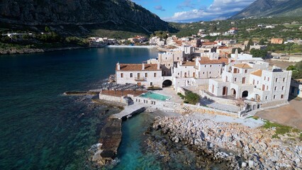 Greece Peloponnese Gerolimenas is one of the most beautiful and traditional seaside villages of Laconia - drone aerial view of amazing Sea Village with Crystal clear  blue water 