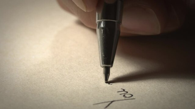 Close up Handwriting with pen Gandhi quote
