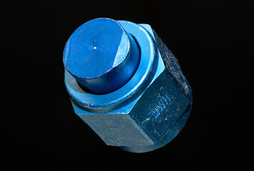 AN hose fitting, blue aluminum cap. For sealing hydraulic, fuel, and oil lines. Isolated on black...