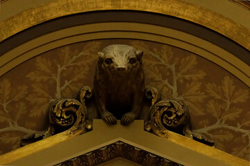 Bucky the Badger, symbol of Wisconsin. Statue in place in the state capitol building displaying the resiliency of the people. Government building architecture