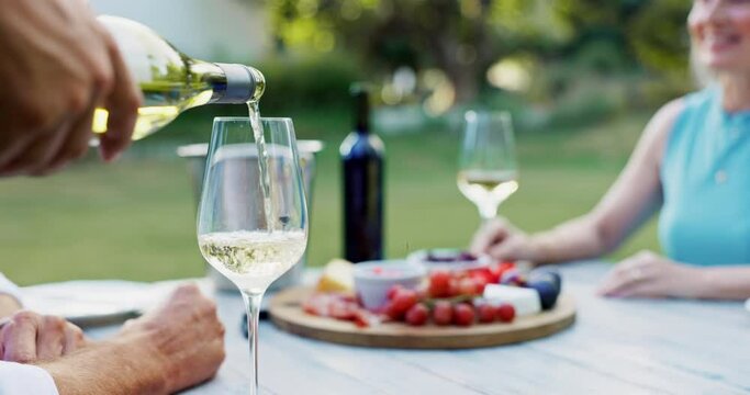 Glass, charcuterie and wine with couple for date, anniversary or celebration at sunset. Closeup of man, woman and happy with alcohol at restaurant for relax, bonding and enjoyment outdoors at table