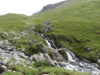 Fototapeta na wymiar Waterfall on the way up Scafell pike