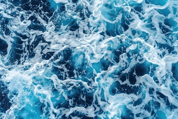 Background of blue sea water with foam and waves