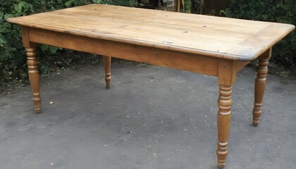 A Vintage Farmhouse Table With Turned Legs