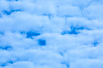 Sly full of clouds over beautiful blue sky.