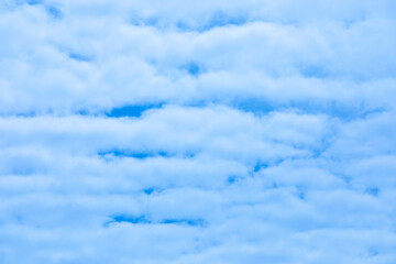 Sly full of clouds over beautiful blue sky.