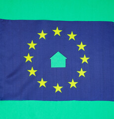 European Union flag. Green home. Concept. European Green Deal. Top view.