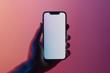 A hand is showcased against a gradient background holding a modern smartphone with a blank screen, ideal for mockup designs - obrazy, fototapety, plakaty