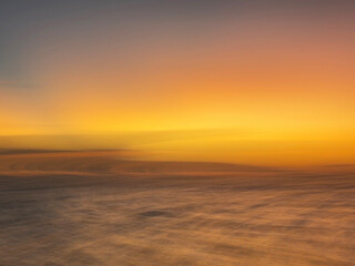 Fototapeta na wymiar Sunrise over steaming ocean Indonesia