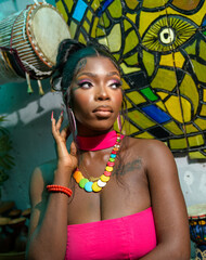 A portrait of a young african lady with colourful beads
