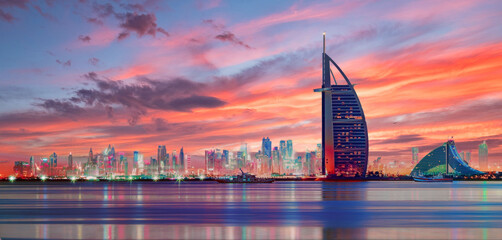 Sunrise Hues Reflecting on Dubai Skyline with Burj Al Arab and Jumeirah Beach Hotel