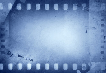 Film negatives frames blue background

