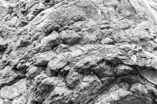 Colored stones texture and background. Rock texture. Black and white image.