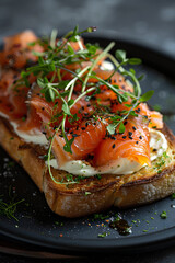 Gourmet smoked salmon on toast with cream cheese and dill, a savory treat.