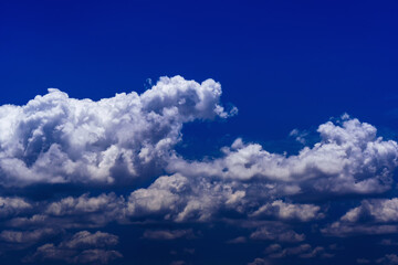 Naklejka na ściany i meble Beautiful cumulonimbus clouds with blue sky background.