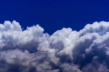 Naklejka na ściany i meble Beautiful cumulonimbus clouds with blue sky background.