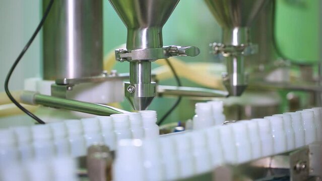 Pharmaceutical manufacturing dry powder syrup production line collage. montage of video clips of medicine drug in plastic bottles on medical equipment. collection pharma making compilation of videos 