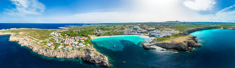 Areal drone view of the Arenal d'en Castell beach on Menorca island, Spain - 772454582