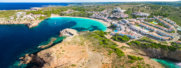 Areal drone view of the Arenal d'en Castell beach on Menorca island, Spain - 772455762