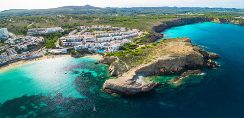 Areal drone view of the Arenal d'en Castell beach on Menorca island, Spain - 772457746