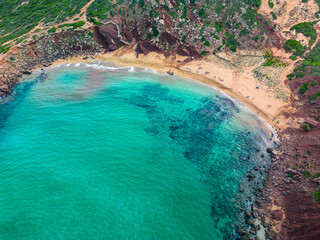Aerial drone view of Cala del Pilar beach scenery of Menorca, near Ferreries - 772468795