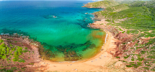 Aerial drone view of Cala del Pilar beach scenery of Menorca, near Ferreries