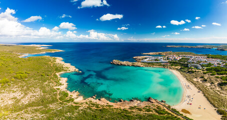 Areal drone view of Arenal de Son Saura beach at Menorca island, Spain - 772477347
