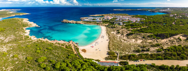 Areal drone view of Arenal de Son Saura beach at Menorca island, Spain - 772477931