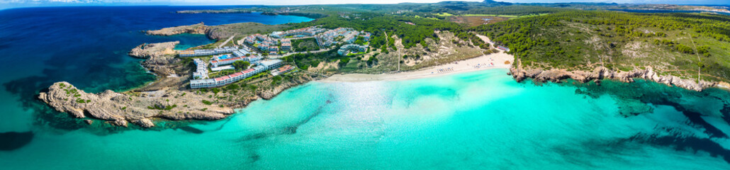 Areal drone view of Arenal de Son Saura beach at Menorca island, Spain - 772479749
