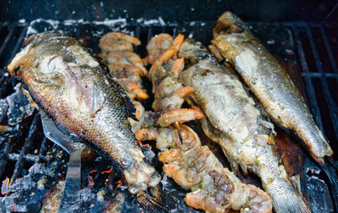 Fish and shrimp on grill