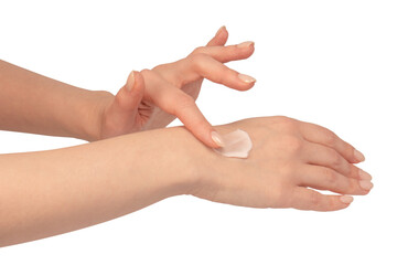 Beige cream tube in woman hands isolated on a white background. Cream swatch on woman hand.