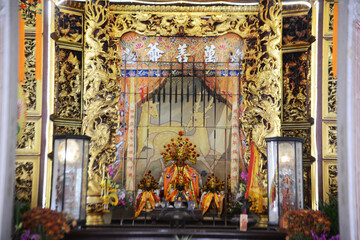 Chinese god statue inside pavilion at Dhammaktanyu Foundation Shrine or Dhammaktanyu Temple or Xianlu Dai Tiang Kong.