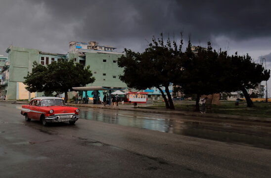 Blackish skies over Antonio Maceo Park and San Lazaro Street after heavy downpour, menace of a storm to come in the evening. Havana Centro-Cuba-121