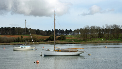 Sailing boats on the river Deben at Woodbridge Suffolk.