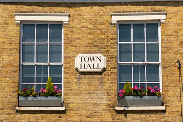 June 2023, Ware, Hertfordshire, UK: View of the old town hall with flower boxes