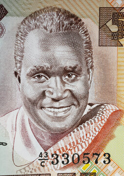 Portrait of former president Kenneth Kaunda on Zambia 5 Kwacha currency banknote (focus on center)