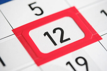 Calendar date. The 12th number the calendar is highlighted in a red frame.