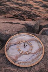 Resin handmade watch on the stone