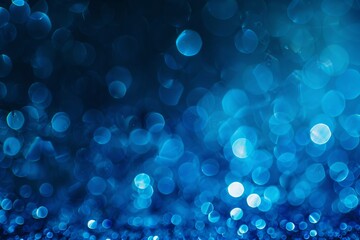 Festive blue bokeh background with sparkling glitter and shimmering lights. Perfect for Christmas...