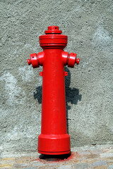 Old red fire hydrant on the street. Fire hidrant for emergency fire access - 772526985