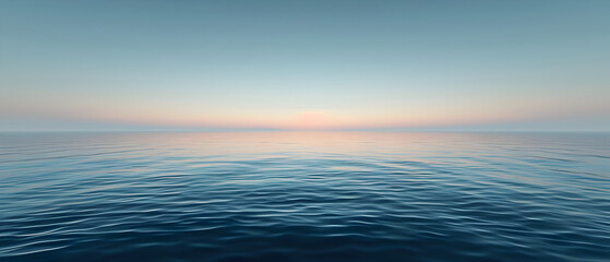 Obraz premium A tranquil sea extends to infinity under a pastel dawn sky, inviting reflection and peace