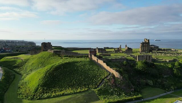 Drone shot of the ruins of Tynemouth Priory and Castle in Tynemouth town, England, UK