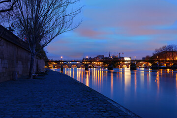 The sunrise view of Paris, Seine river, Arts bridge in the early morning .