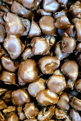 prunes in chocolate, dessert, heap, background, dried fruits in chocolate, glaze
