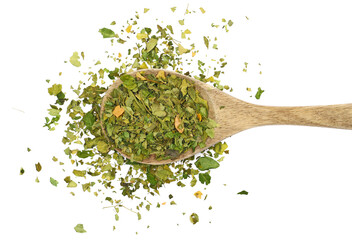 Organic Moringa green tea in wooden spoon isolated on white, top view