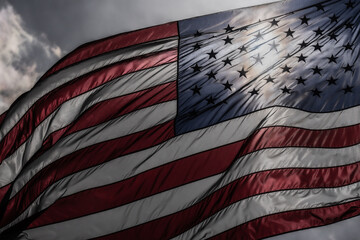 US Flag. Waving american flag on dark dramatic sky. USA flag. Grunge American flag.