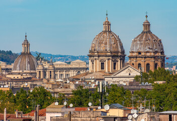 Fototapeta na wymiar Rome cityscape with church domes seen from Aventine hill, Italy